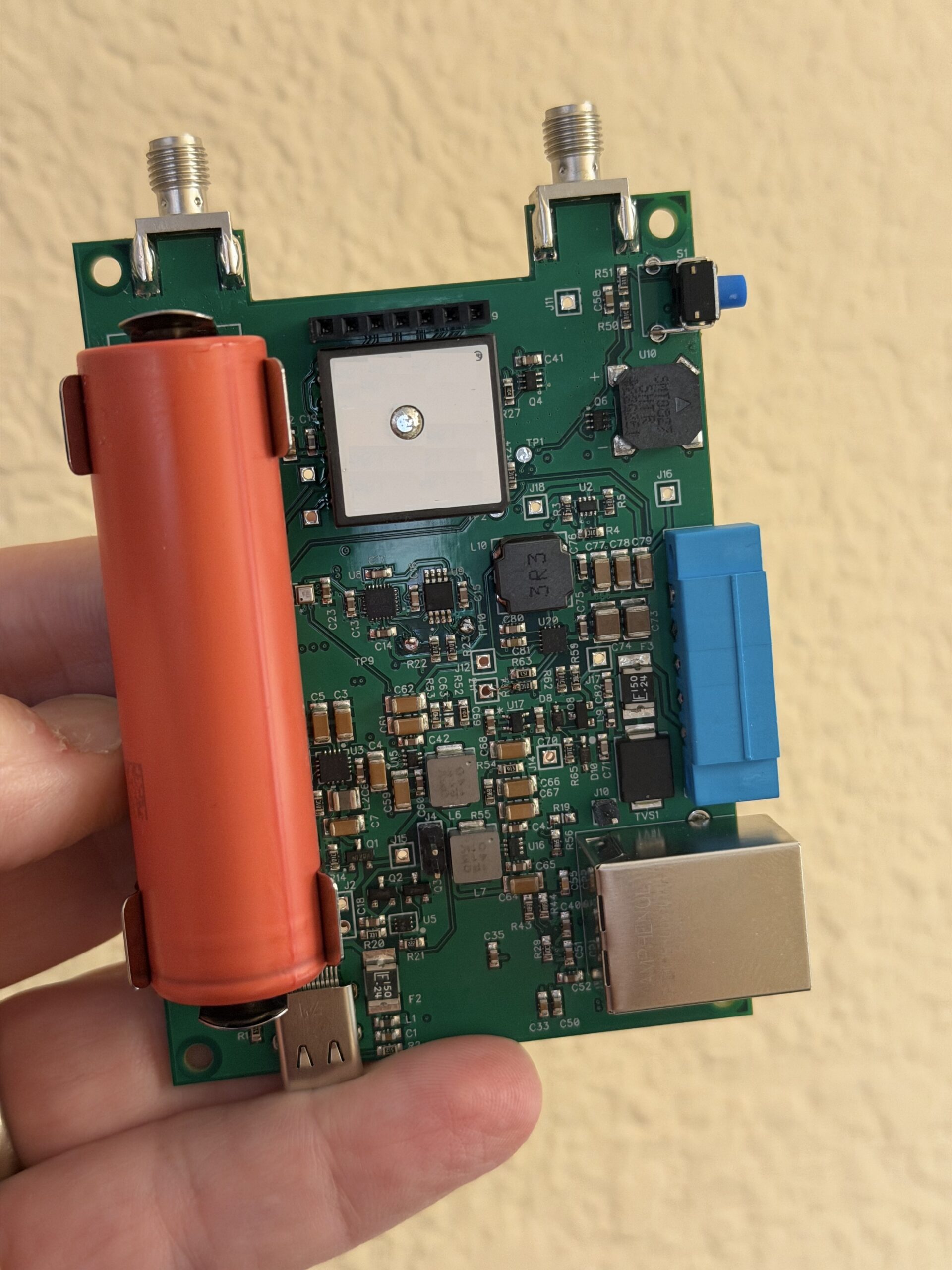 Steve Sokol holds a FlightBox v3 circuit board.